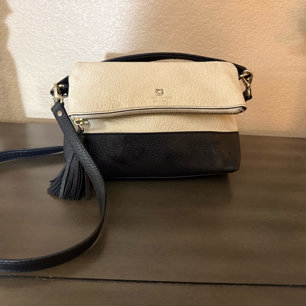 Two-Tone Black and Cream Crossbody Bag - Foldover Tassel Design